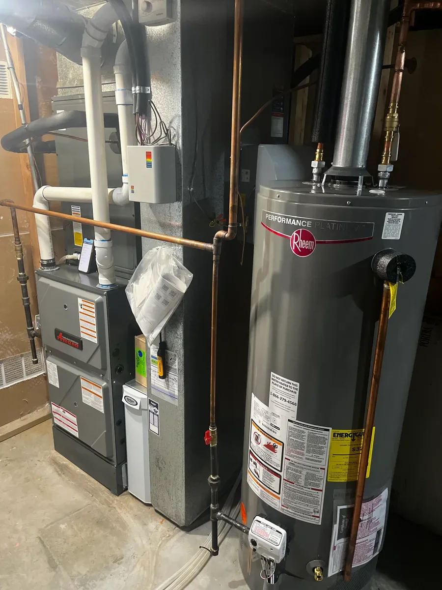 Completed furnace replacement beside the same water heater in Lake St. Louis.